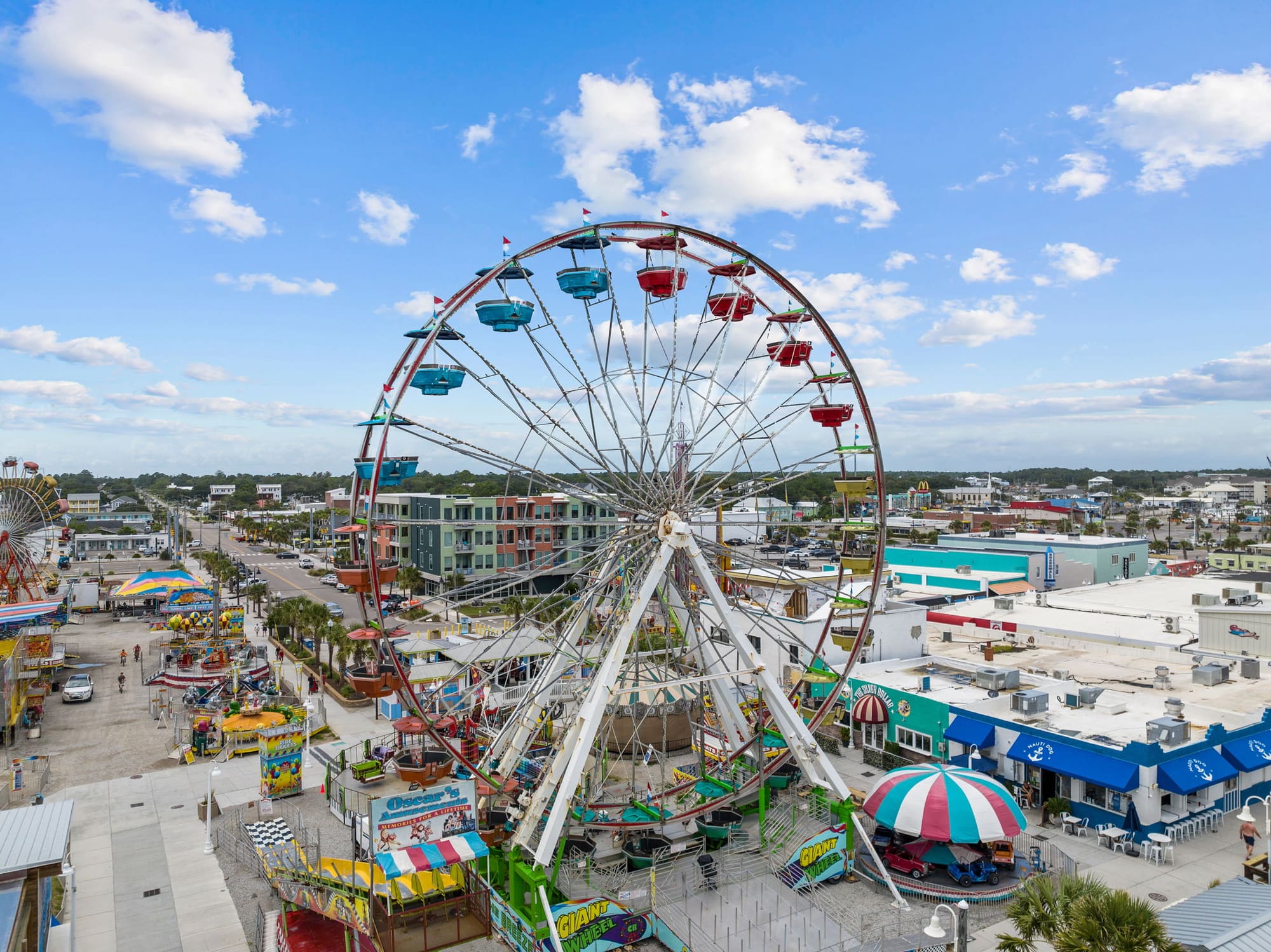 Aerial view of the Carolina Beach Boardwalk, Ferris wheel and oceanfront
