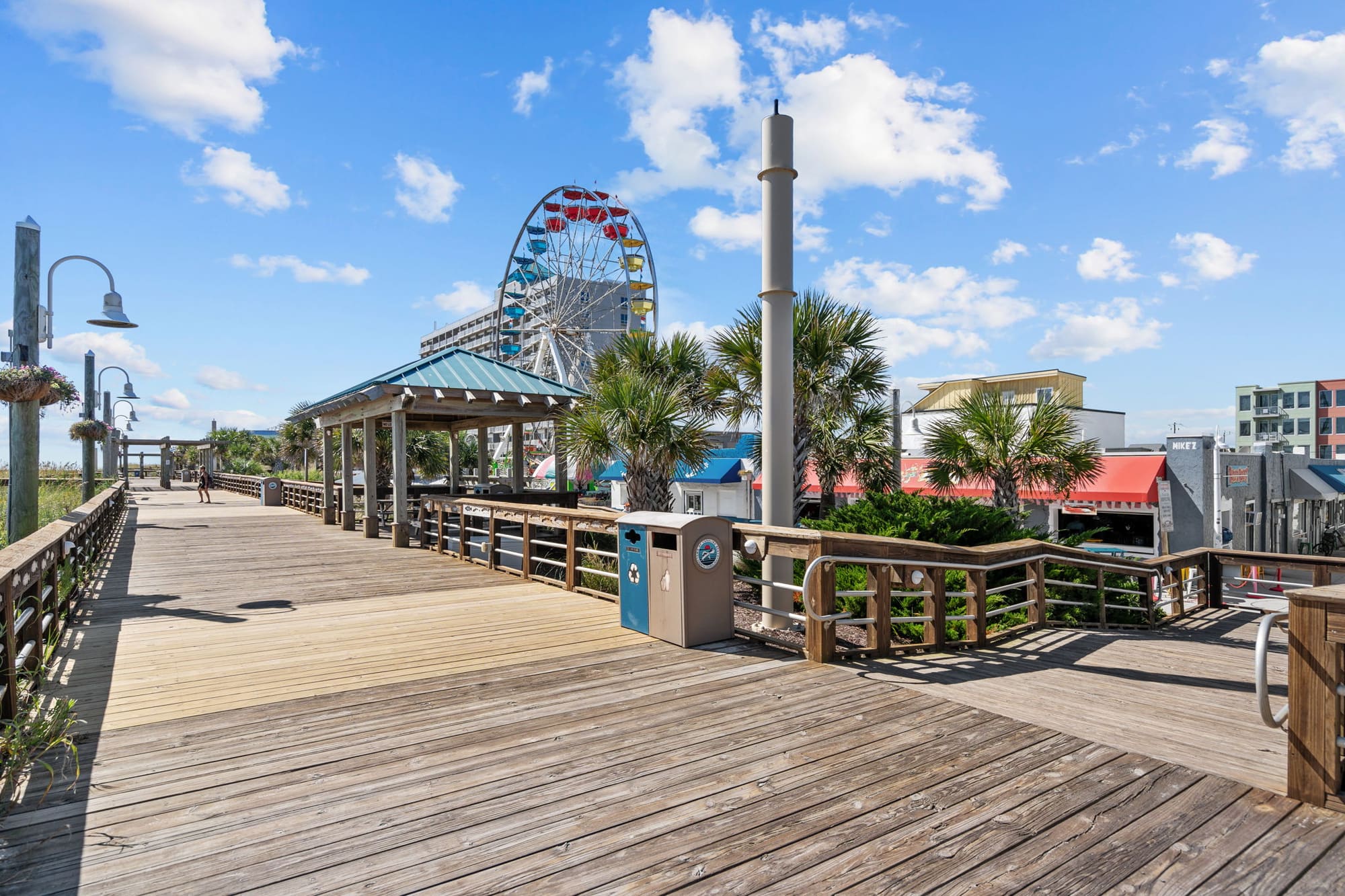 Palms along the Carolina Beach Boardwalk, with the Ferris wheel beyond