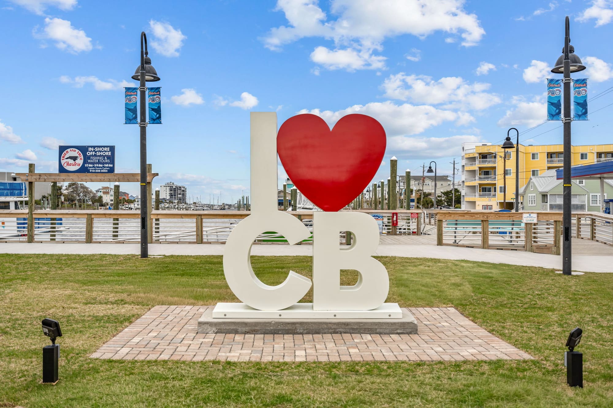The I love CB sign on the lawn by the Carolina Beach Boardwalk